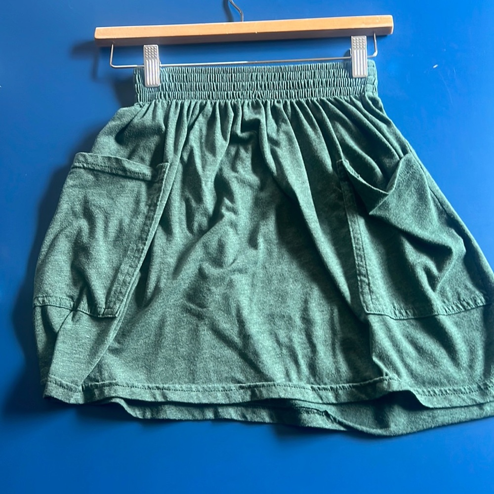 green skirt with side pockets